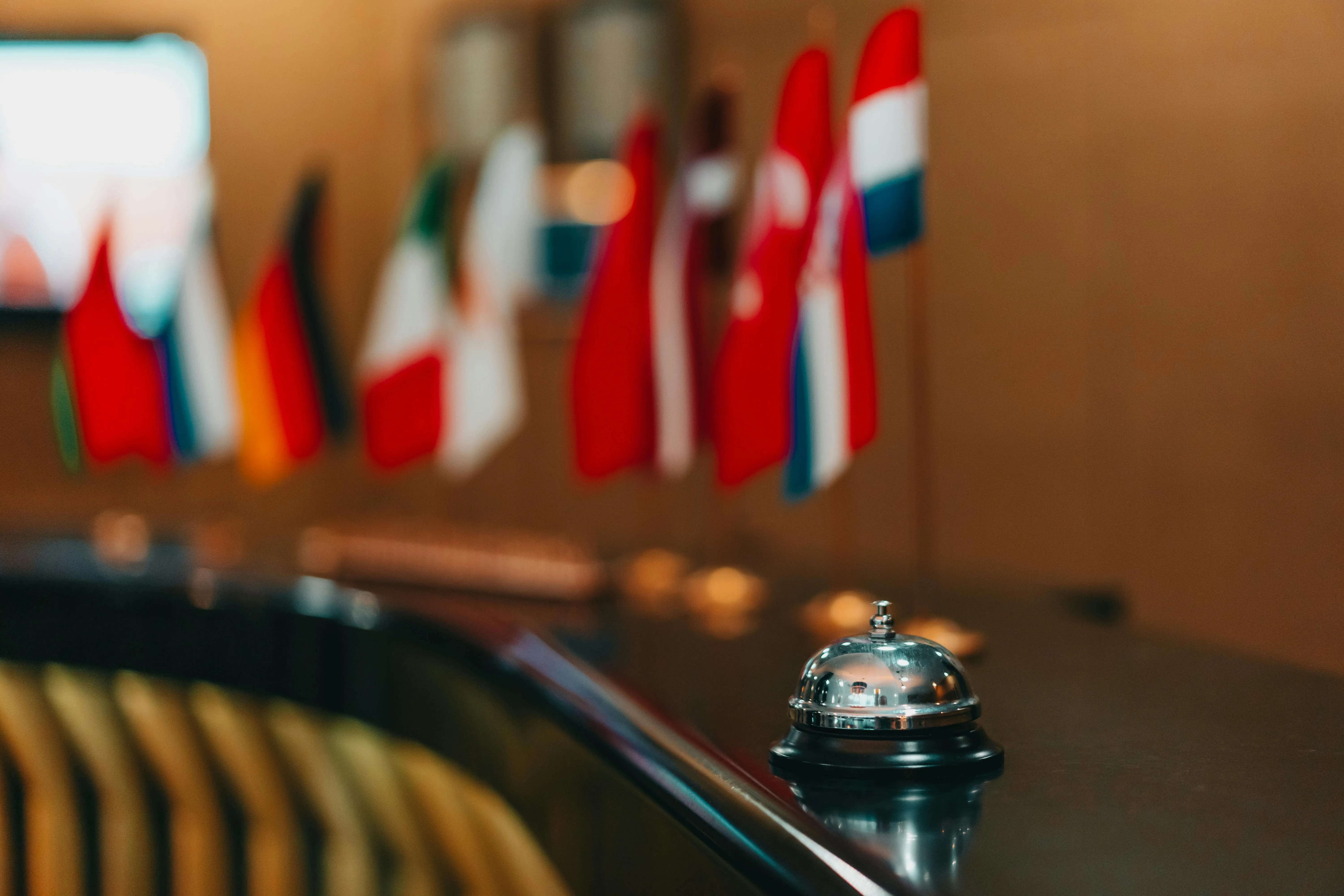 Dubai-based expat reviewing their ICP entry-exit report and Emirates ID to decide between the 183-day, 90-day and centre-of-interests TRC routes