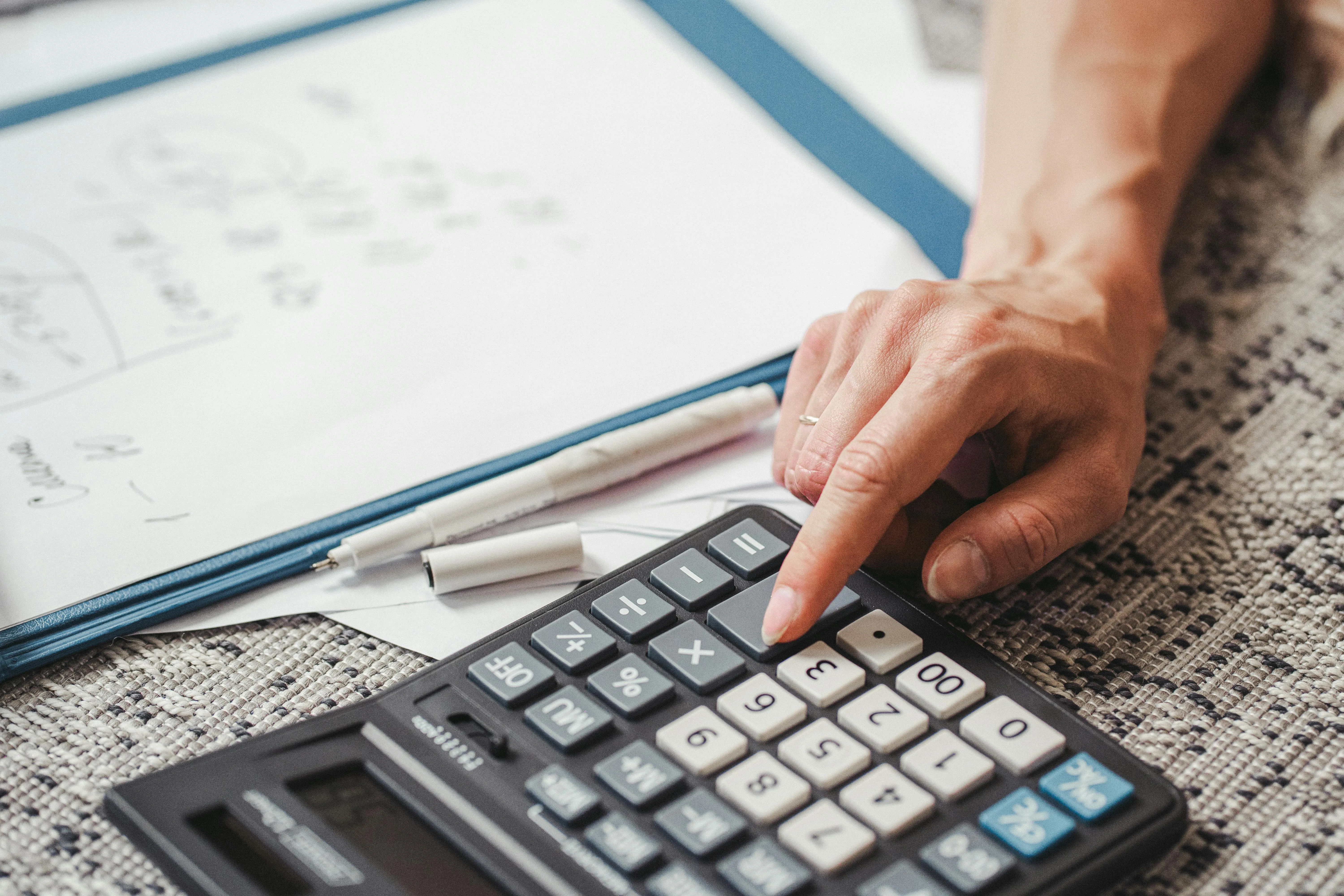 Corporate tax services in Abu Dhabi for AD DED mainland, ADGM and KEZAD entities covering registration, QFZP claims, transfer pricing and EmaraTax filing