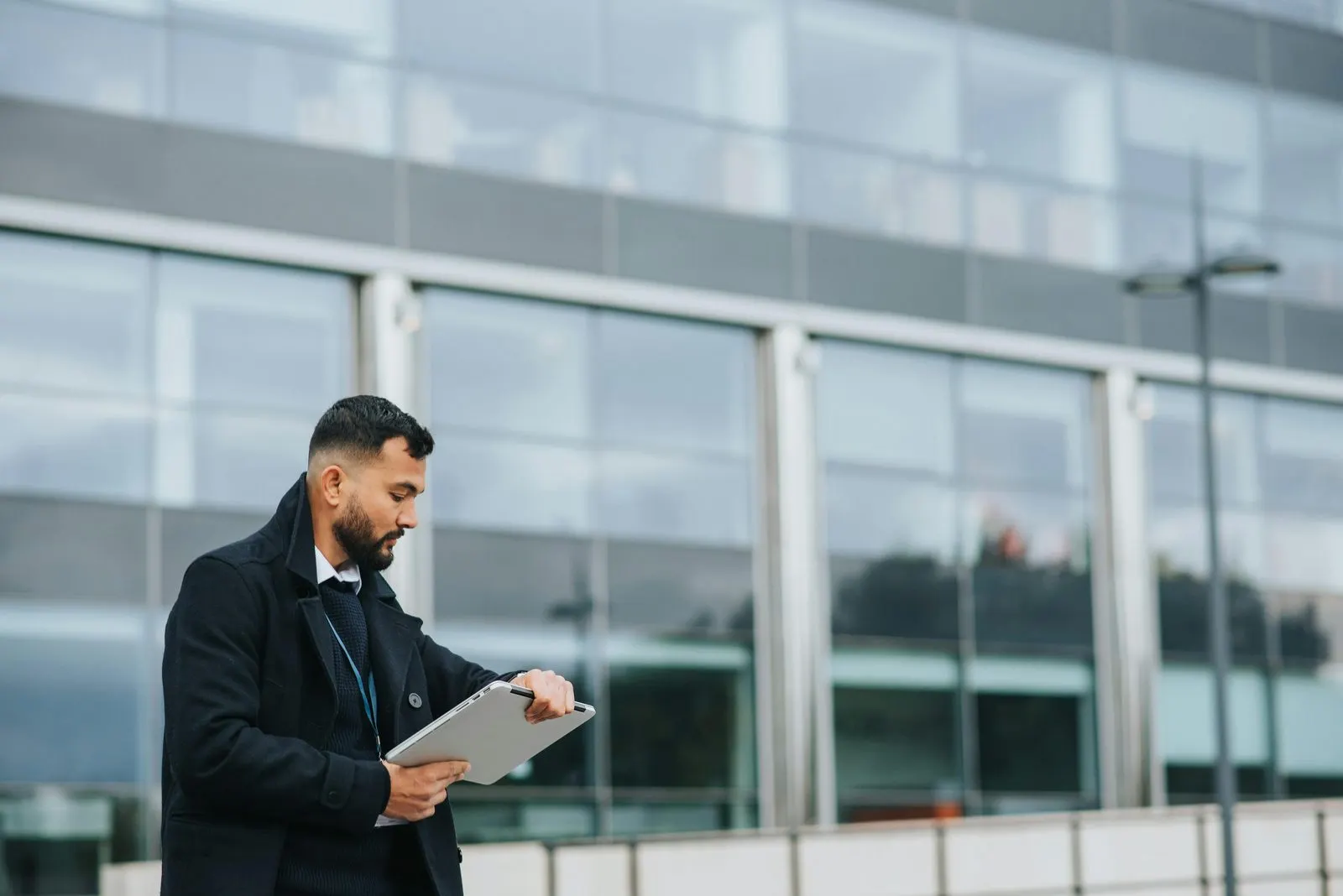 Business owner reviewing documents to open an offshore bank account in Dubai — corporate bank account application for a UAE company