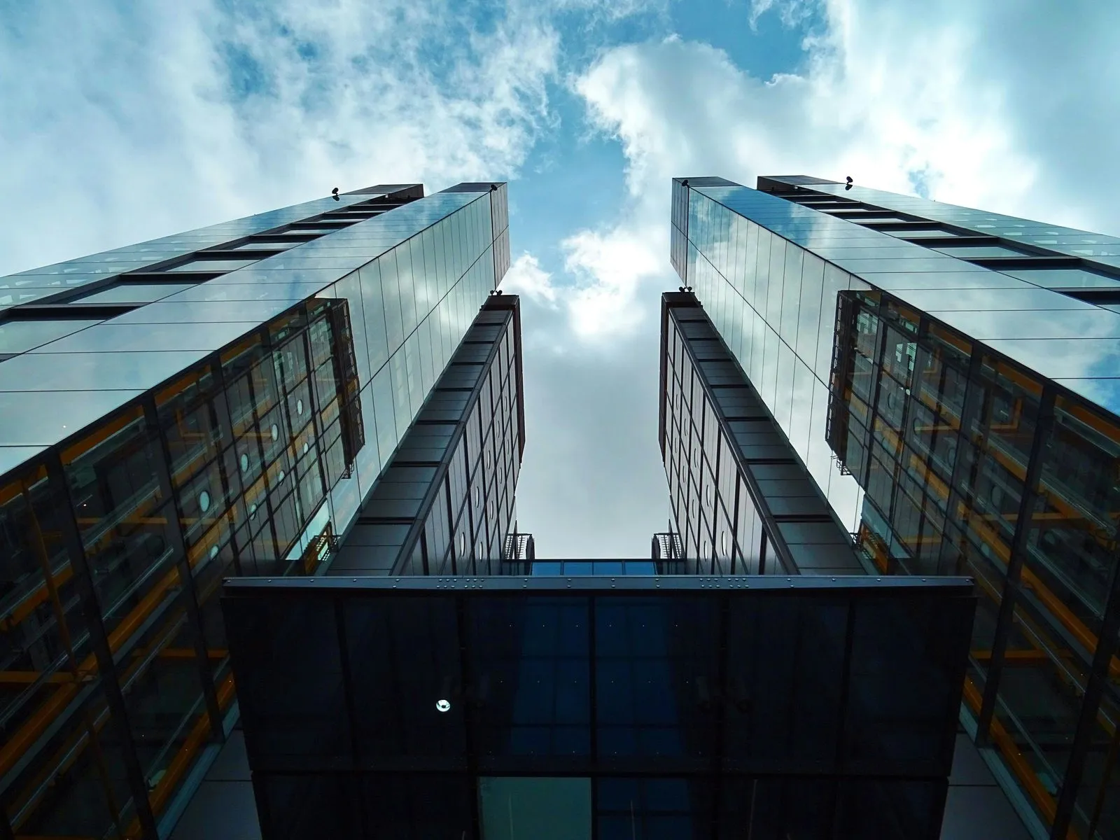 Comparison of UAE Corporate Tax Group consolidation versus 75% related-party loss transfer and business-restructuring relief on an advisor's worksheet