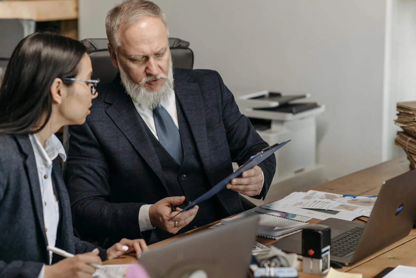 Accountant reconciling UAE bank statements against the general ledger and finalising the trial balance during year-end audit preparation