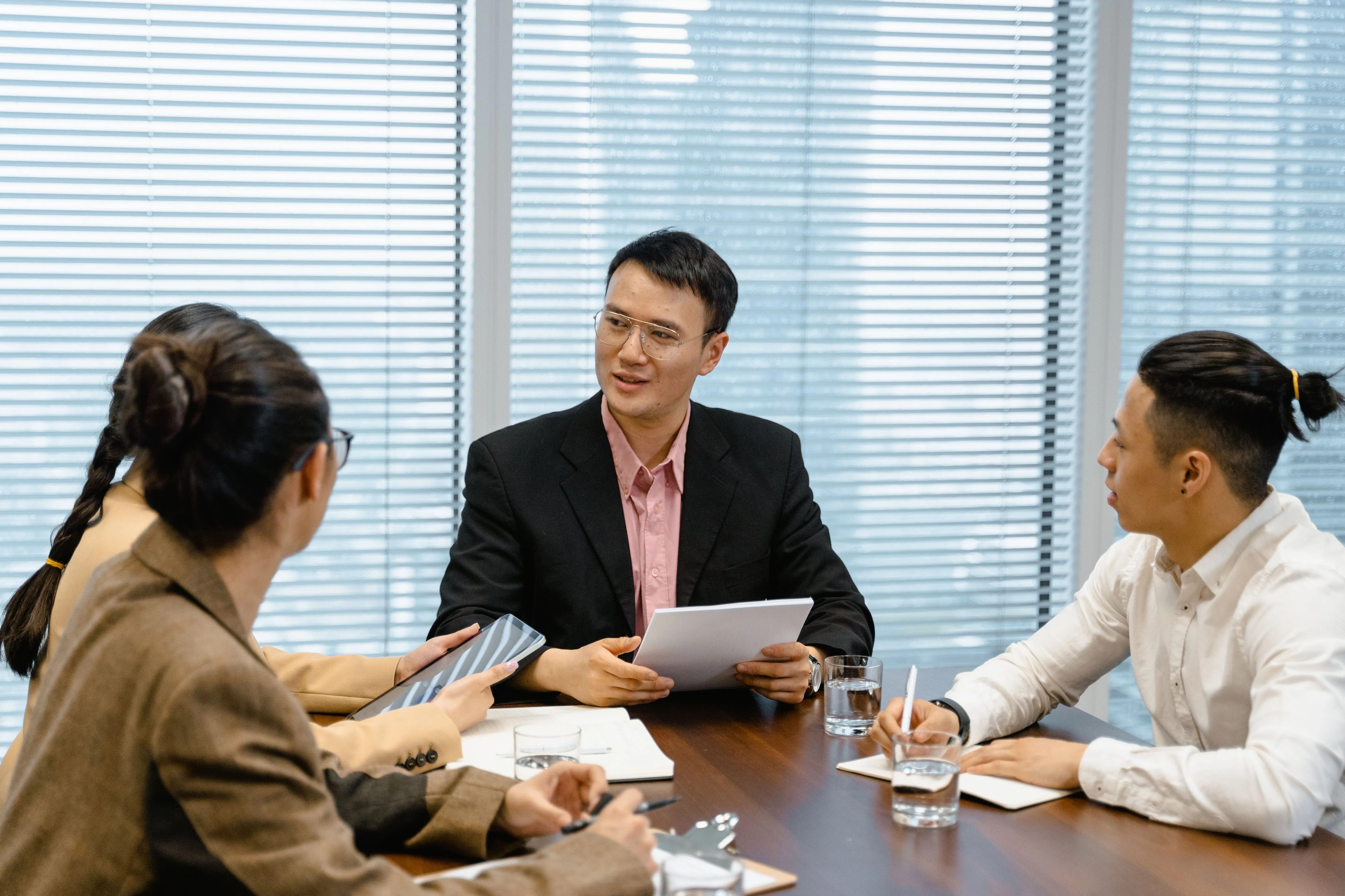 Accountant walking a Dubai business owner through the difference between exempt status and zero-tax position before EmaraTax registration