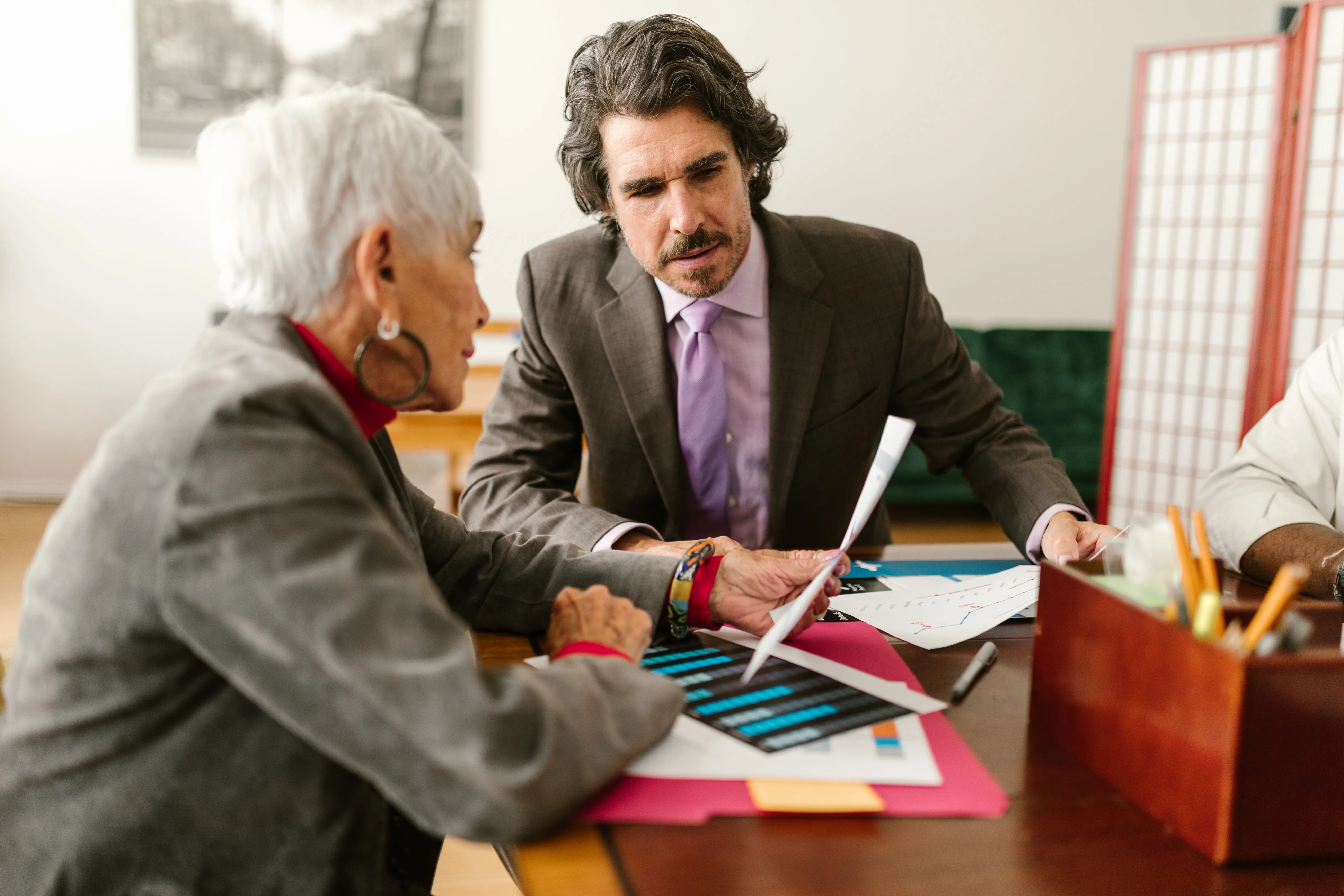 Compliance review session for a UAE offshore holding company examining UBO disclosures, substance documentation and bank account file requirements