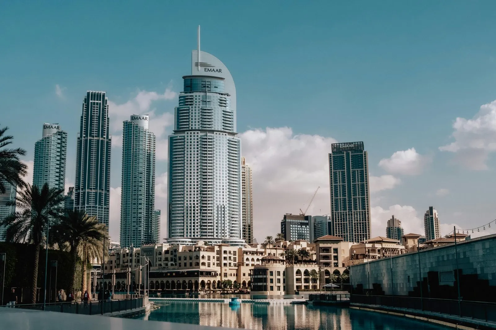 Worked double-entry journal entries for a UAE SME showing debits and credits balancing under the golden rules of accounting