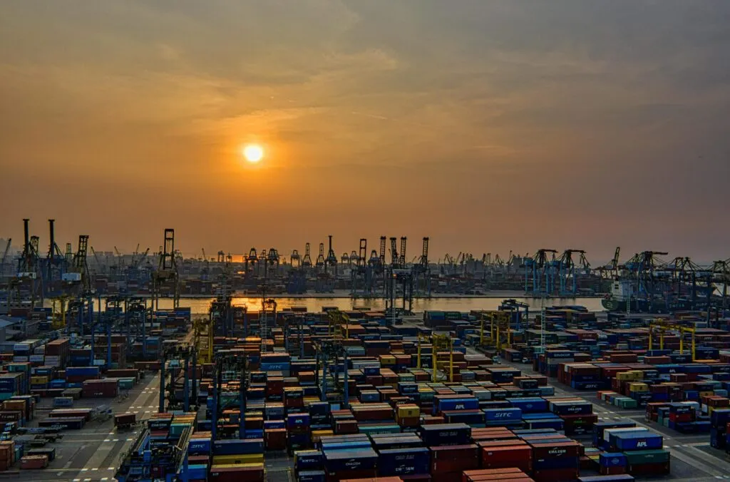 Hamriyah Port deep-water berth in Sharjah UAE serving Hamriyah Free Zone industrial tenants with container handling cranes 2026