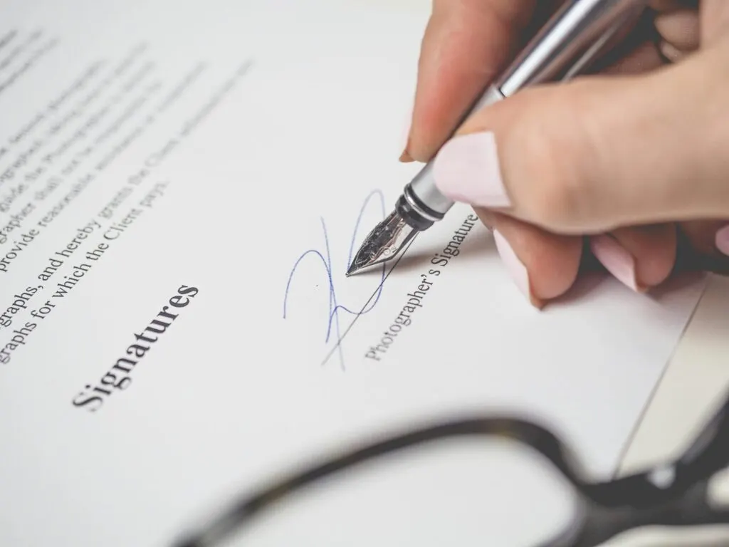UAE business owner and adviser reviewing a commercial contract for force majeure provisions under Article 273 of the Civil Code during a 2026 crisis event