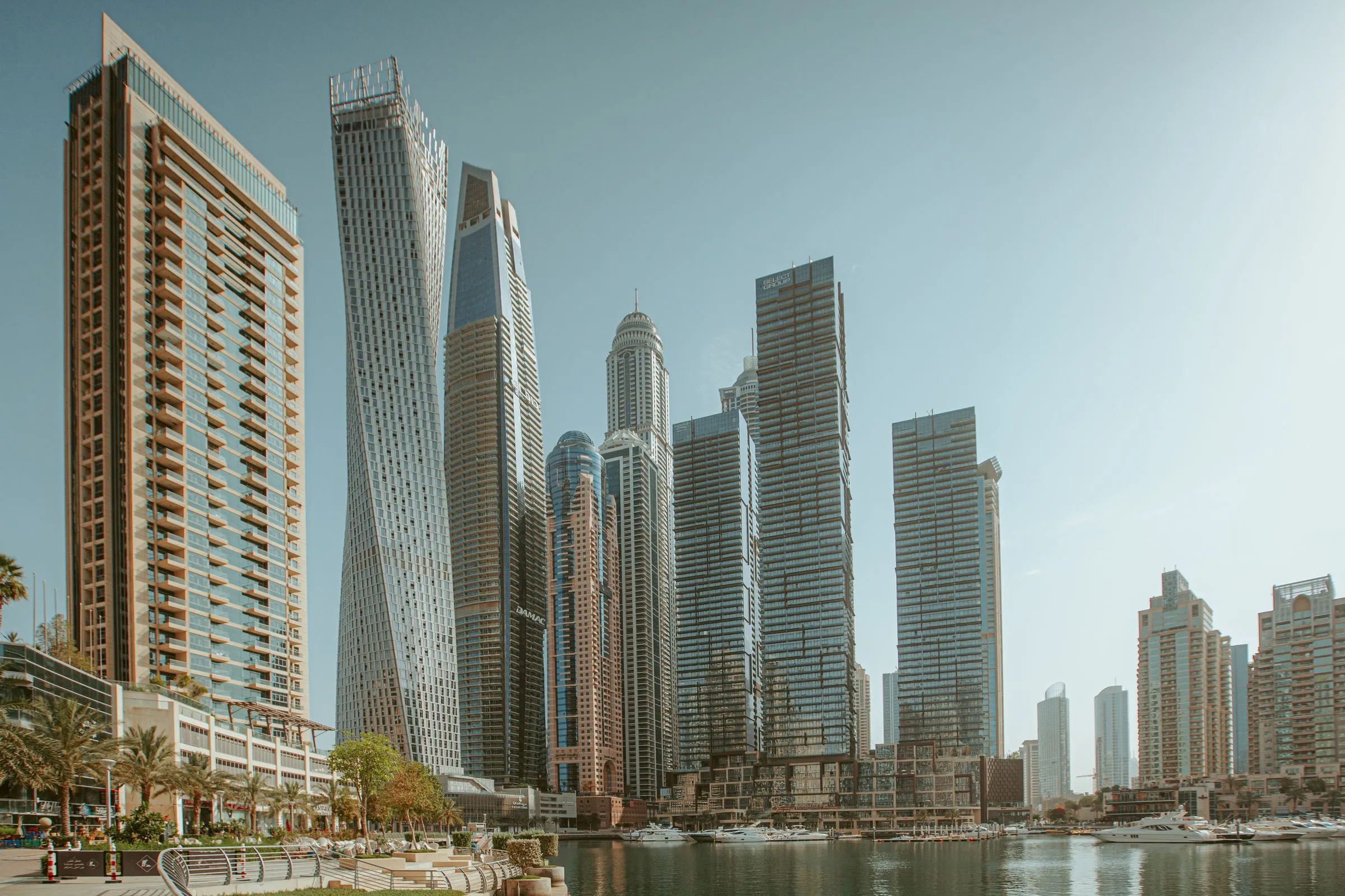 Business setup in Ajman mainland through the Department of Economic Development showing trade licence application and MOA signing