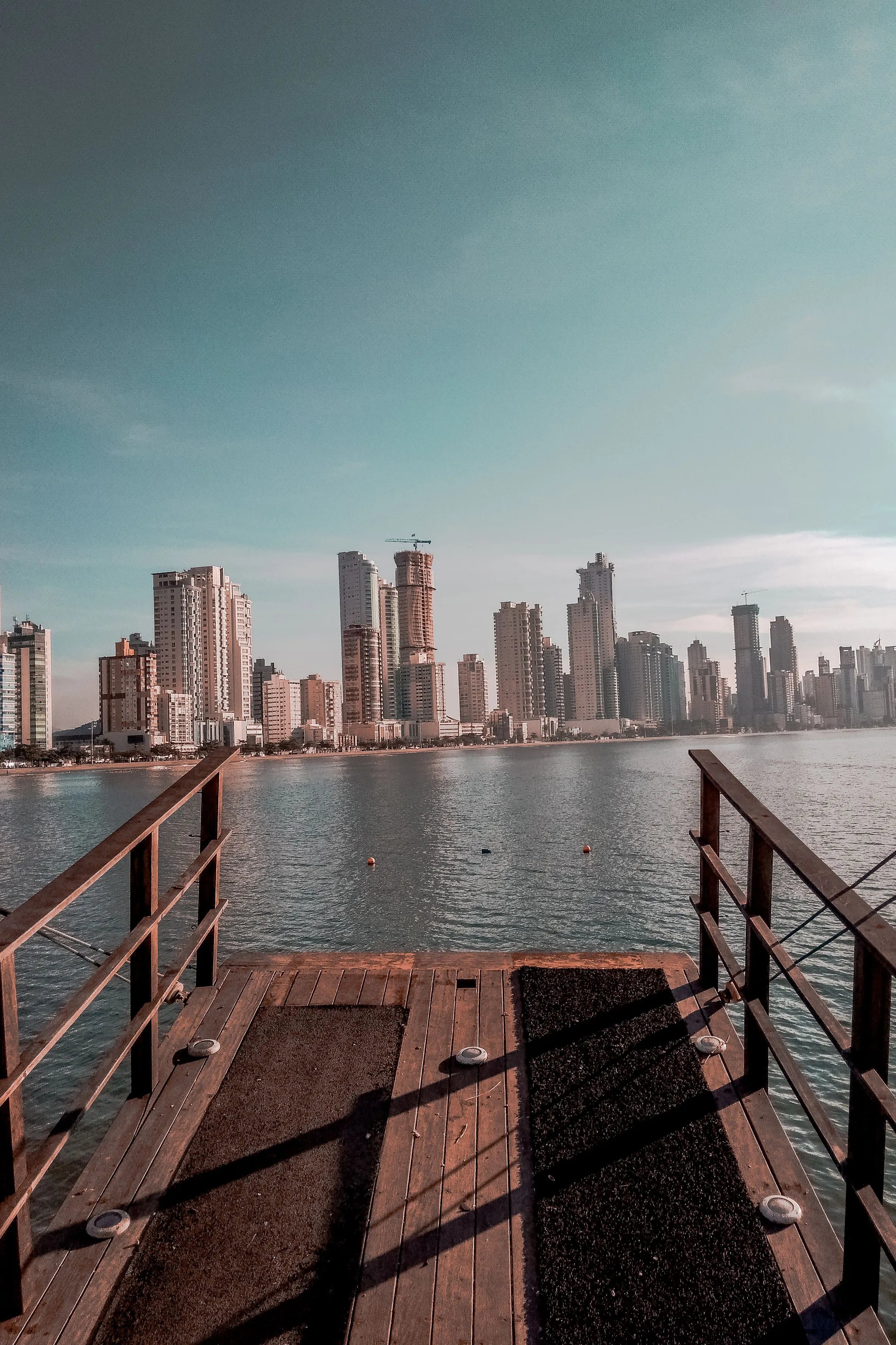 Personal and corporate banking documents with Emirates ID and salary certificate for an Indian resident opening UAE bank accounts