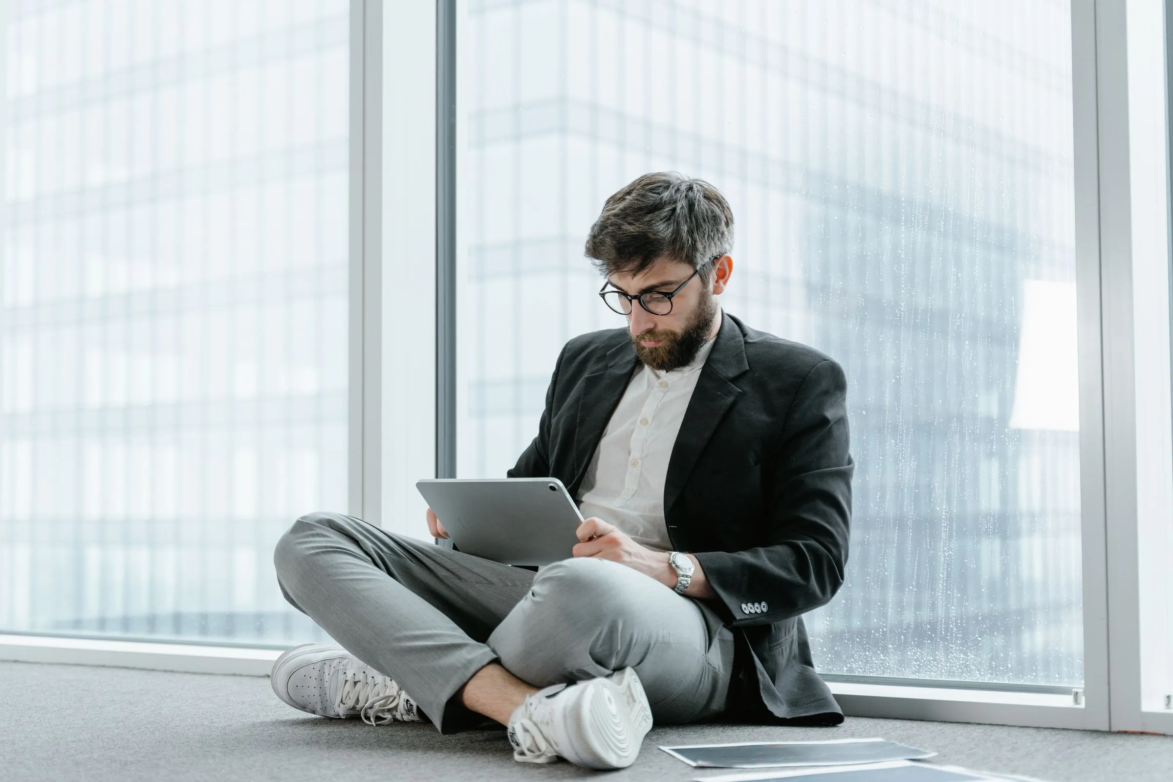 VAT certificate UAE download from the EmaraTax portal showing a business owner retrieving the FTA VAT registration certificate with TRN details