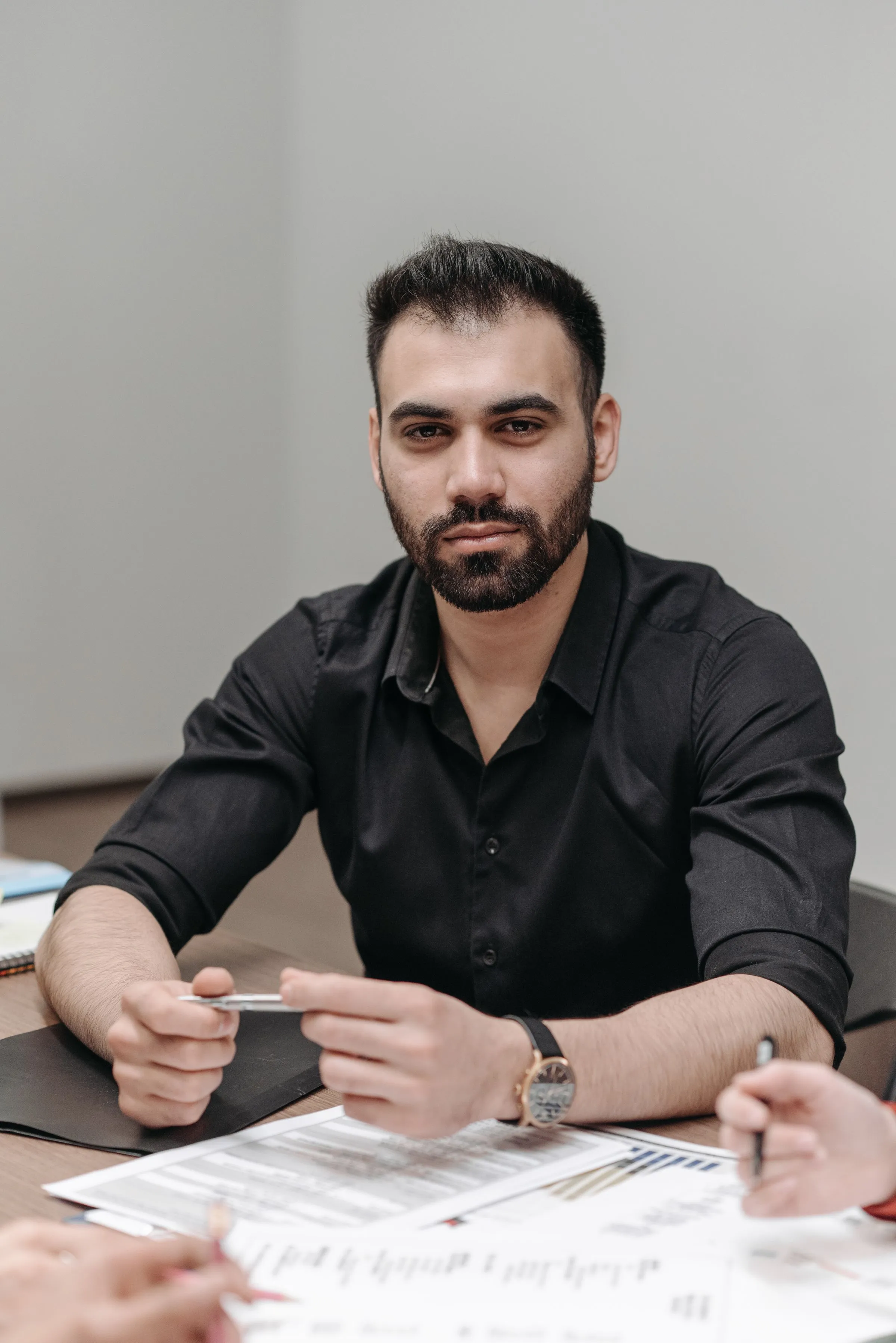 UAE visa cancellation process with employer and employee completing MOHRE work permit and residence visa cancellation steps 2026