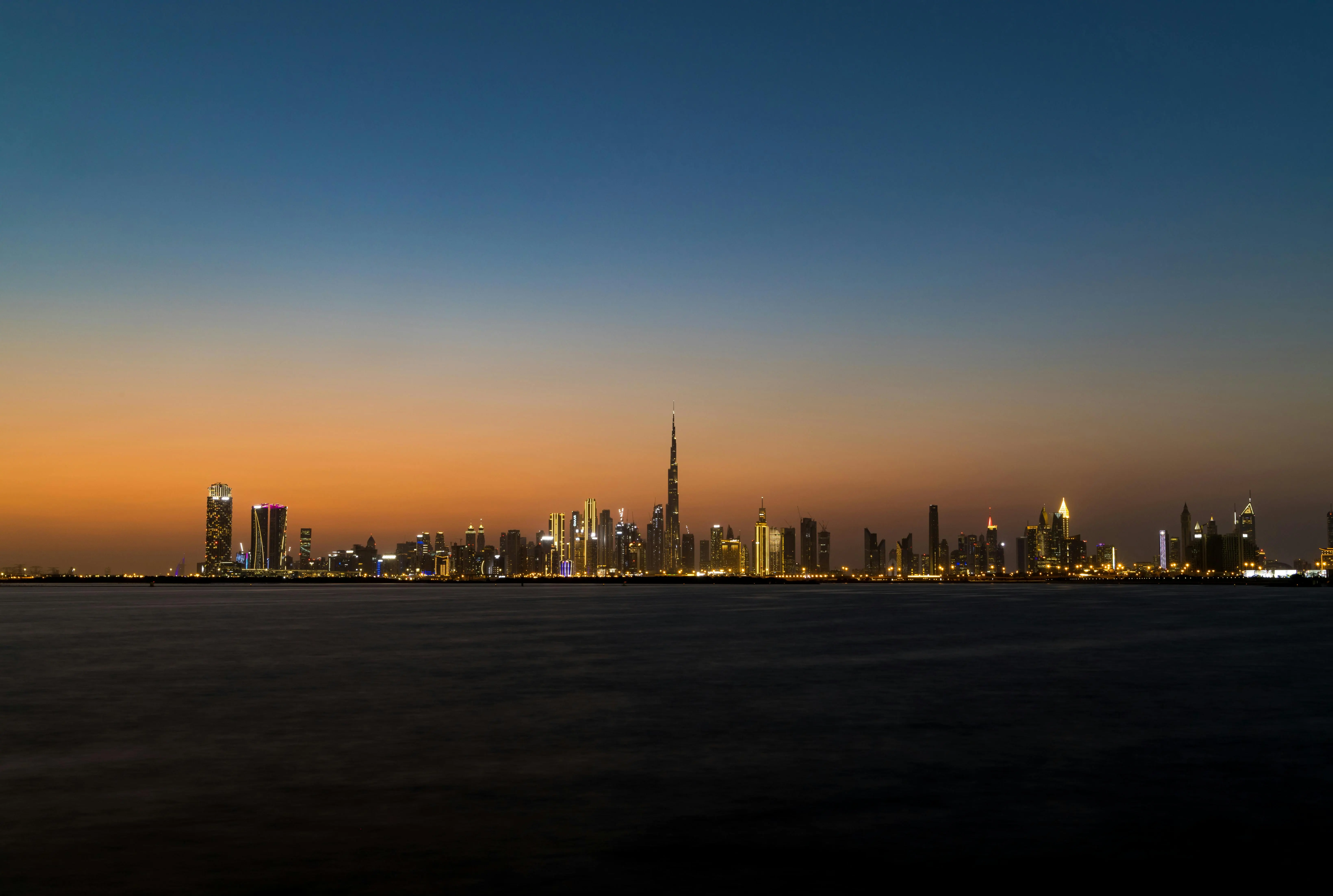 UAE professional arriving at Dubai airport with passport and employment visa documents, ready for medical fitness test and Emirates ID biometric capture