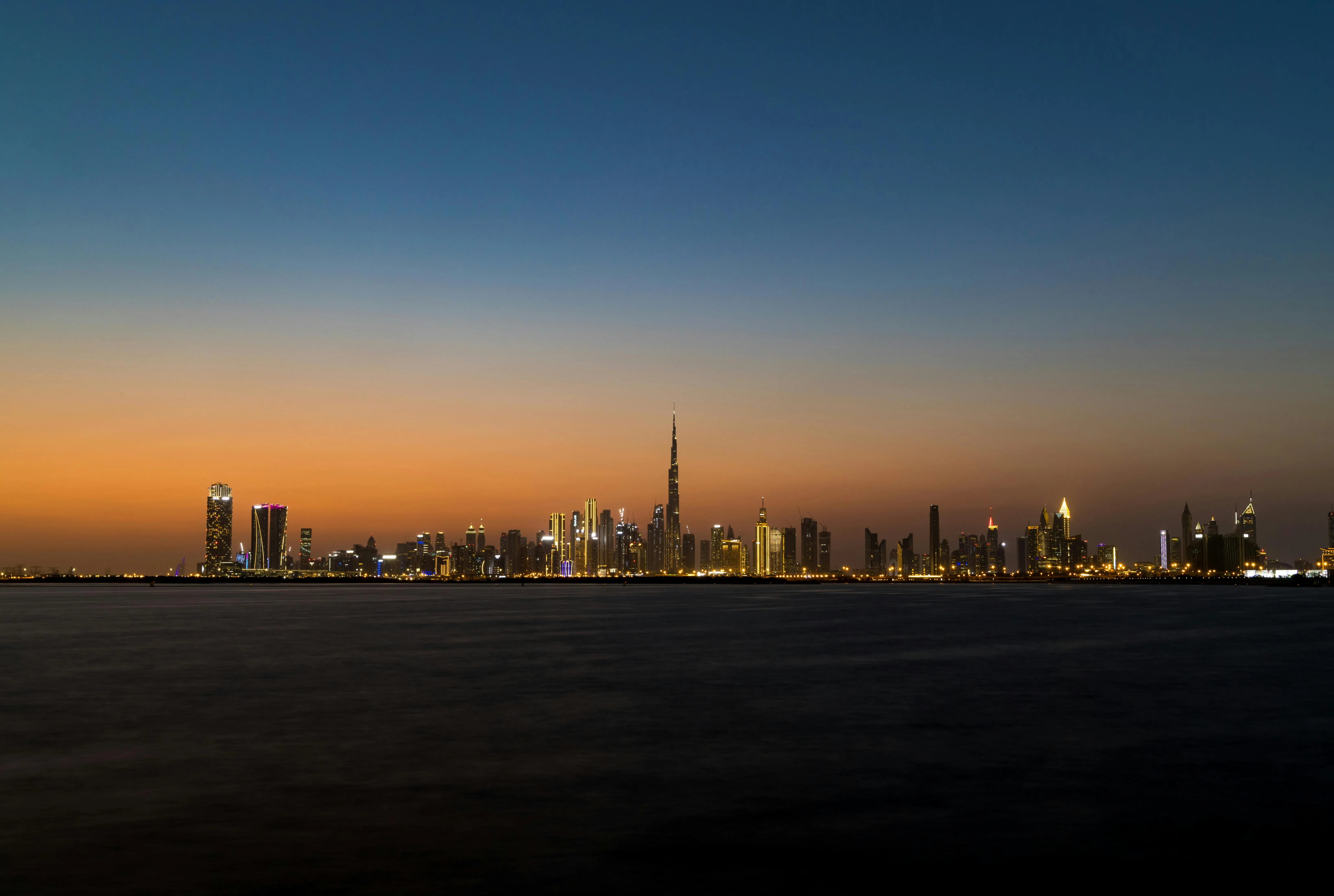 UAE professional arriving at Dubai airport with passport and employment visa documents, ready for medical fitness test and Emirates ID biometric capture