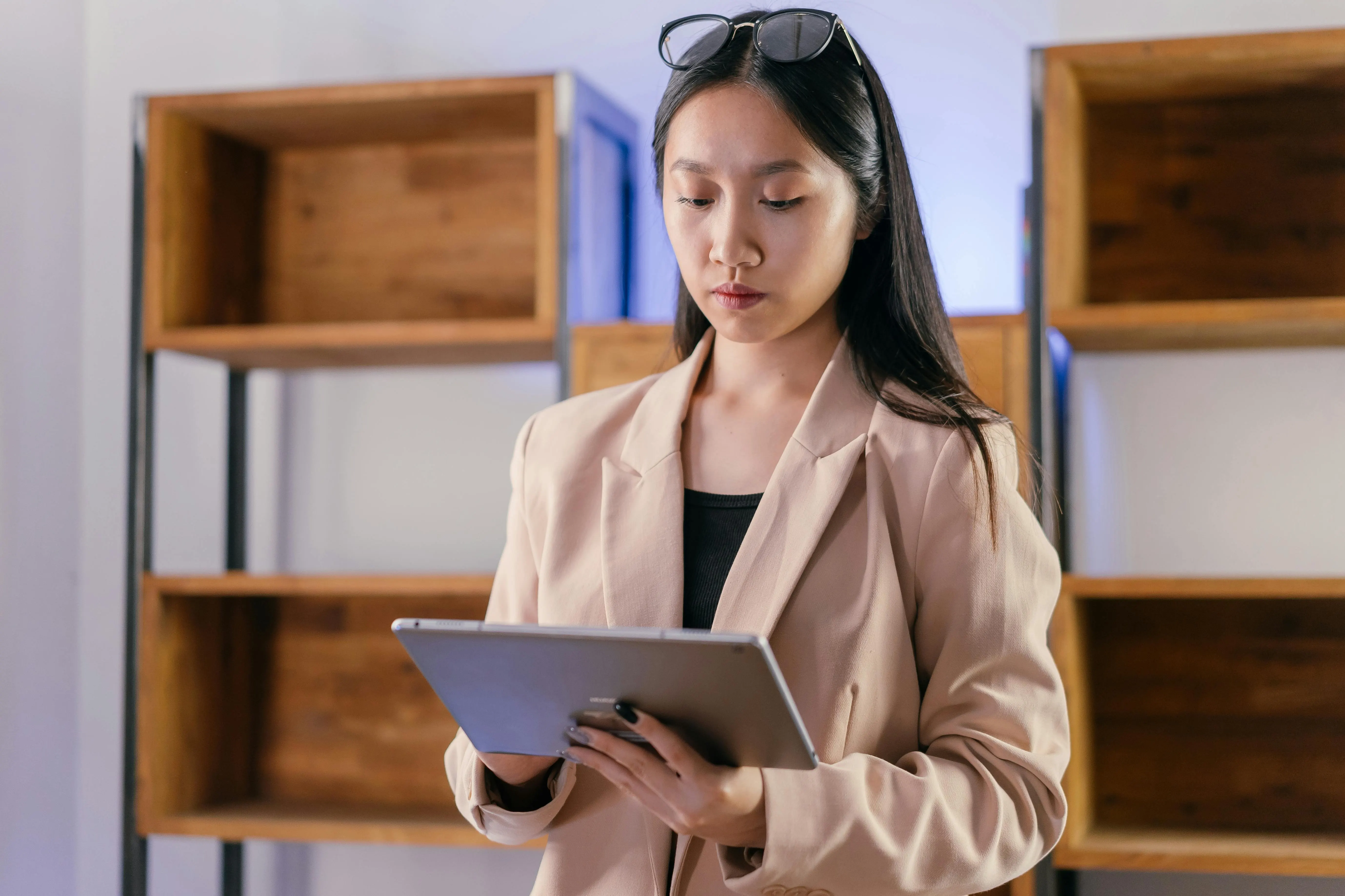Accountant filling in a tax return form alongside calculator and supporting invoices — UAE VAT-201 box-by-box walkthrough, EmaraTax submission and 28-day deadline workflow