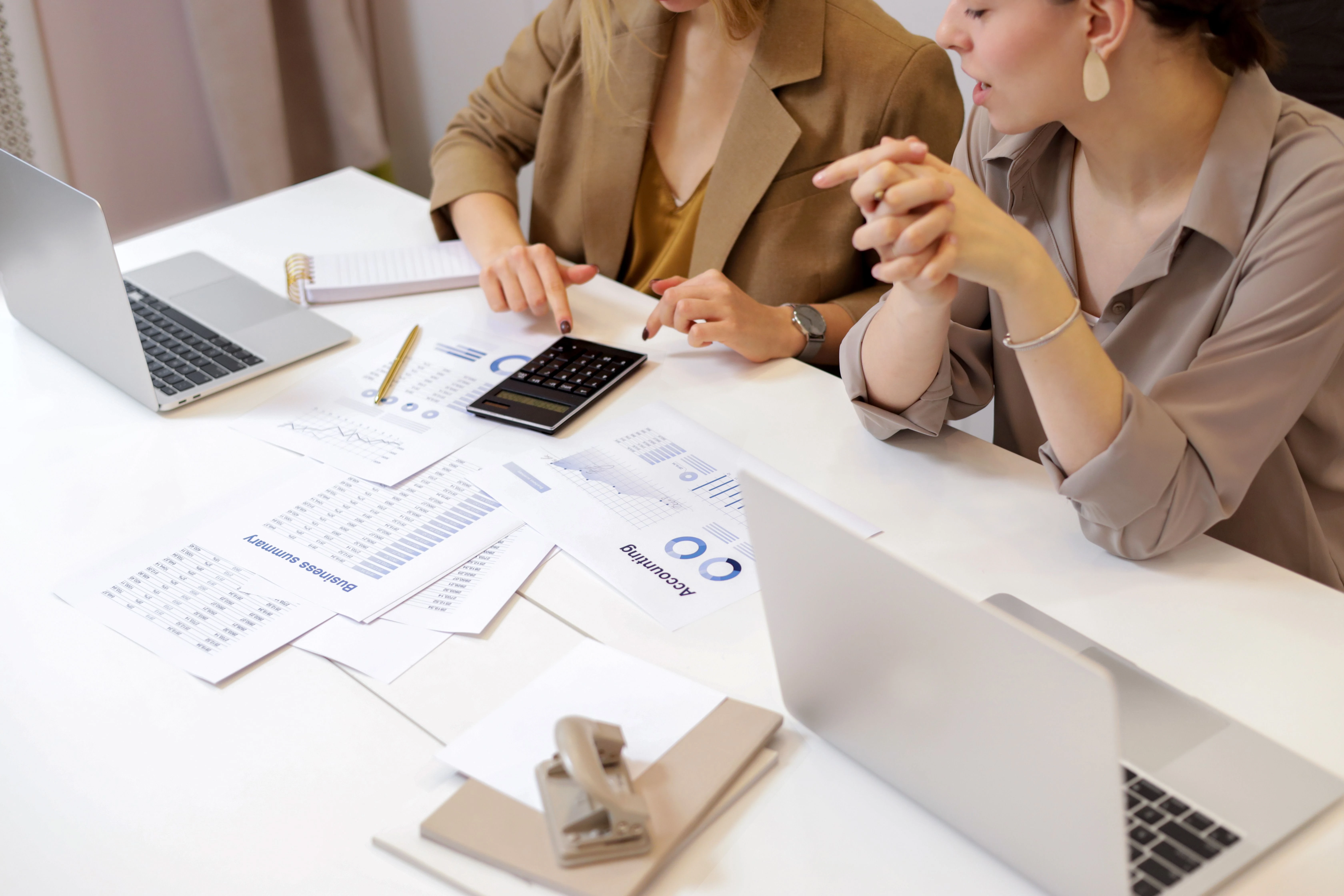 Velmont Crest backlog-accounting specialist reconstructing missing months of records from stacked supplier invoices, bank statements and supporting documents