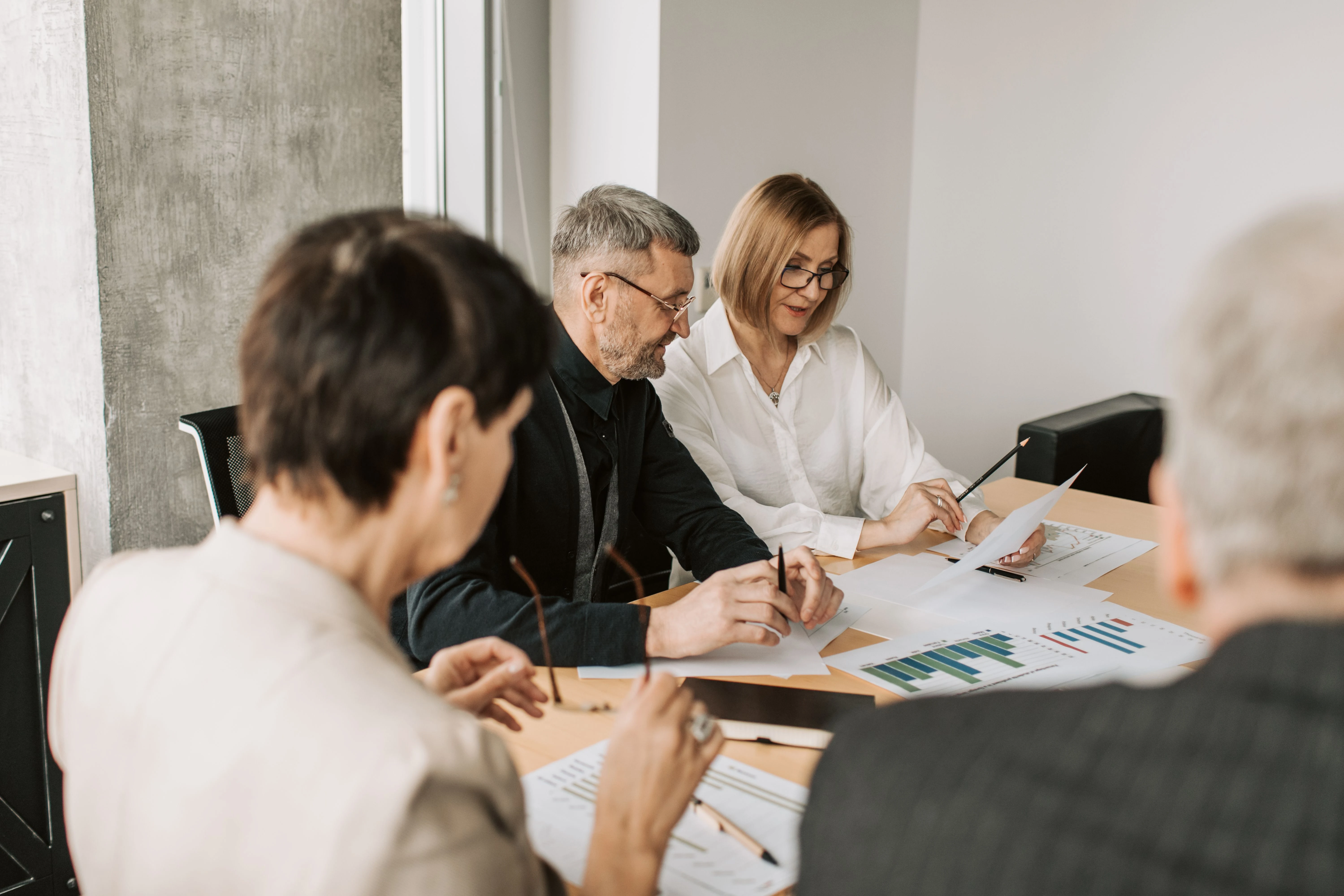 Velmont Crest corporate tax specialist preparing a UAE Federal Decree-Law 47 corporate tax computation with adjustments and supporting schedules on screen